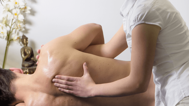 client receiving sports massage