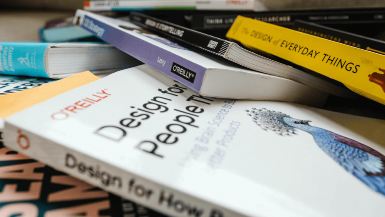 Stack of books for UX and web designers